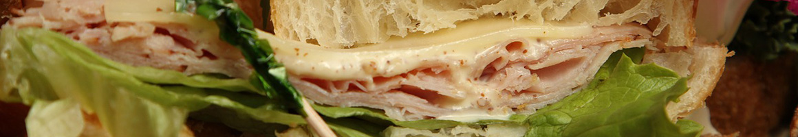 Eating Barbeque Sandwich at Hog Heaven restaurant in Dyersburg, TN.